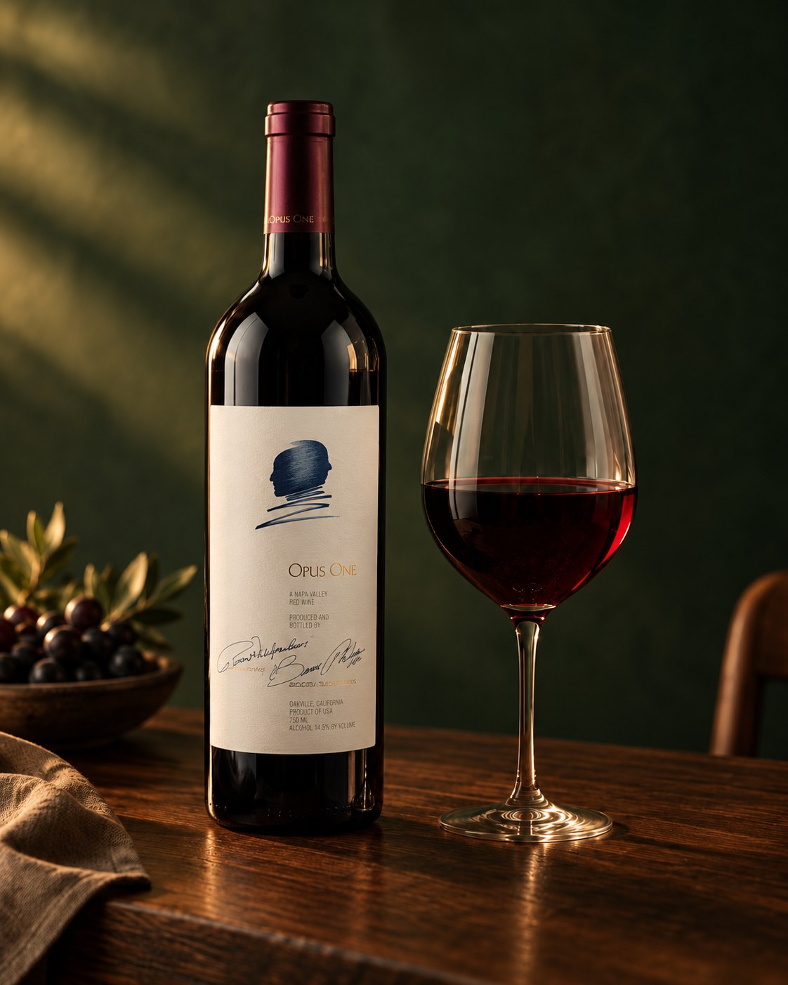 Opus One wine bottle and red wine glass on a dark walnut table